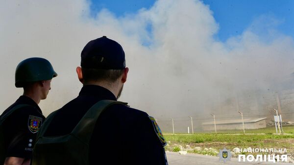 Сотрудники полиции на месте удара по порту в Одесской области
