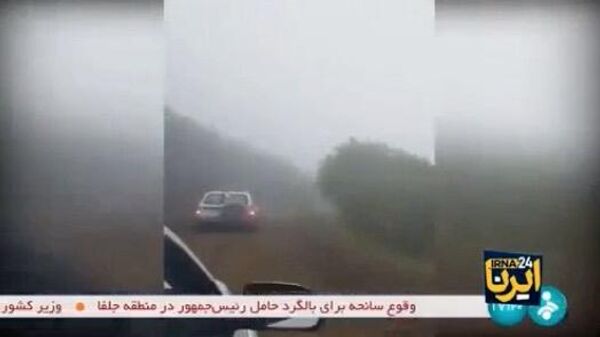 Спасатели прибывают в район происшествия с вертолетом президента Ирана, 19 мая 2024 года