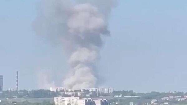 Дым на месте взрыва в Луганске. Кадр видео
