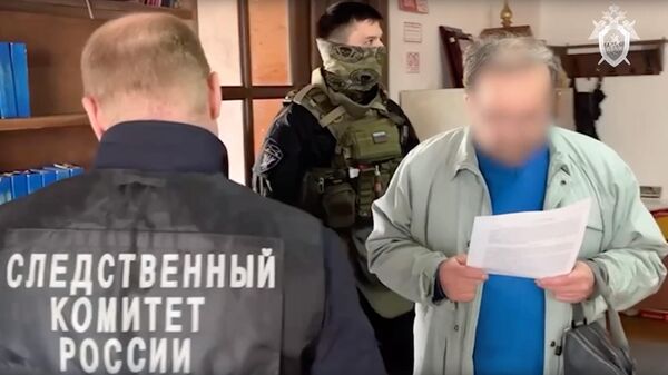 Сотрудники СК РФ задержали священнослужителя, который повесил в своем храме иконы с изображением бандеровцев
