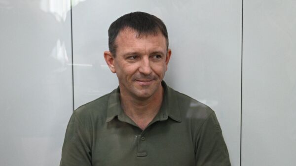 Генерал Попов улыбкой отреагировал на решение суда оставить его в СИЗО