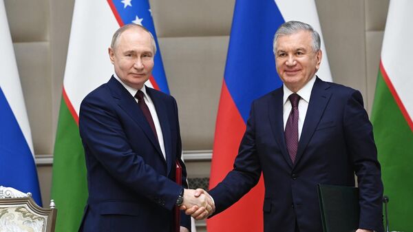 Президент РФ Владимир Путин и президент Узбекистана Шавкат Мирзиеев. 27 мая 2024 года
