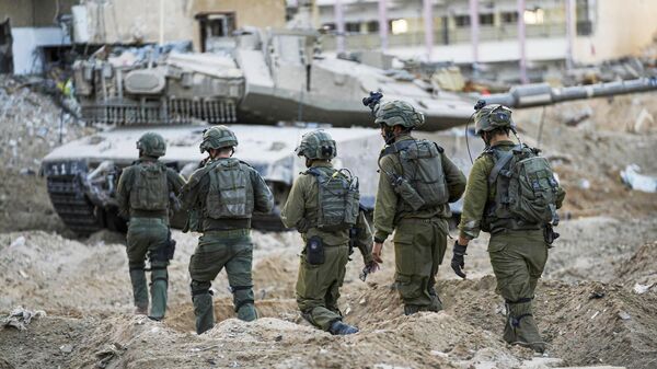 Израильские военные во время наземной операции
