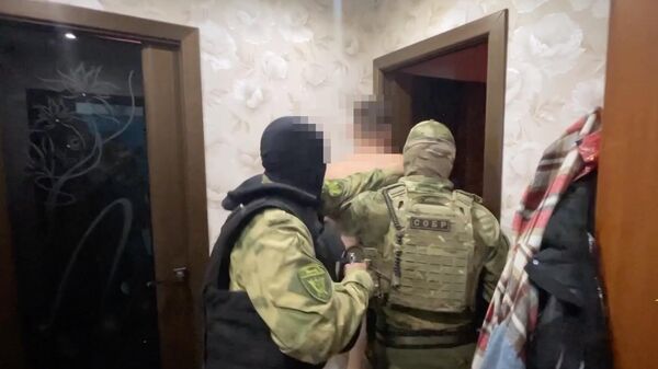 Сотрудники УМВД Ивановской области во время задержания Александра Батурина в городе Коврове Владимирской области