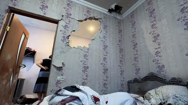 Последствия обстрела частного жилого дома в Донецке