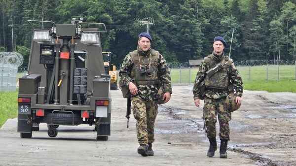 Швейцарские военные охраняют место проведения мирной конференции по Украине на курорте Бюргеншток