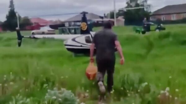 Мужчина, прилетавший в магазин в селе Богословка Омского района на вертолете