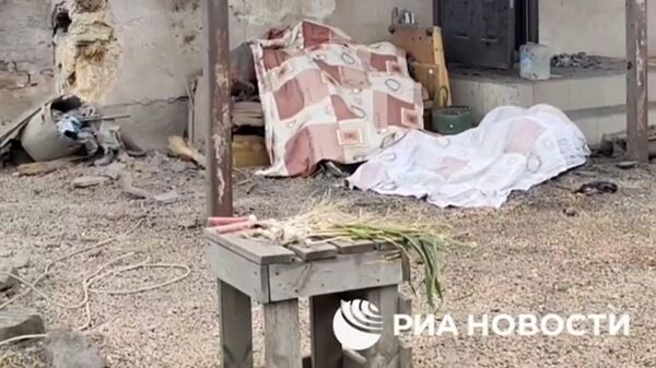 Последствия украинского обстрела Петровского района в Донецке
