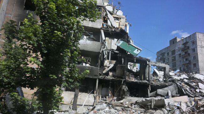Разрушенные дома в Авдеевке в ДНР