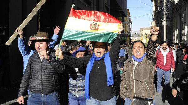 Сторонники президента Боливии Луиса Арсе на площади Мурильо в Ла-Пасе