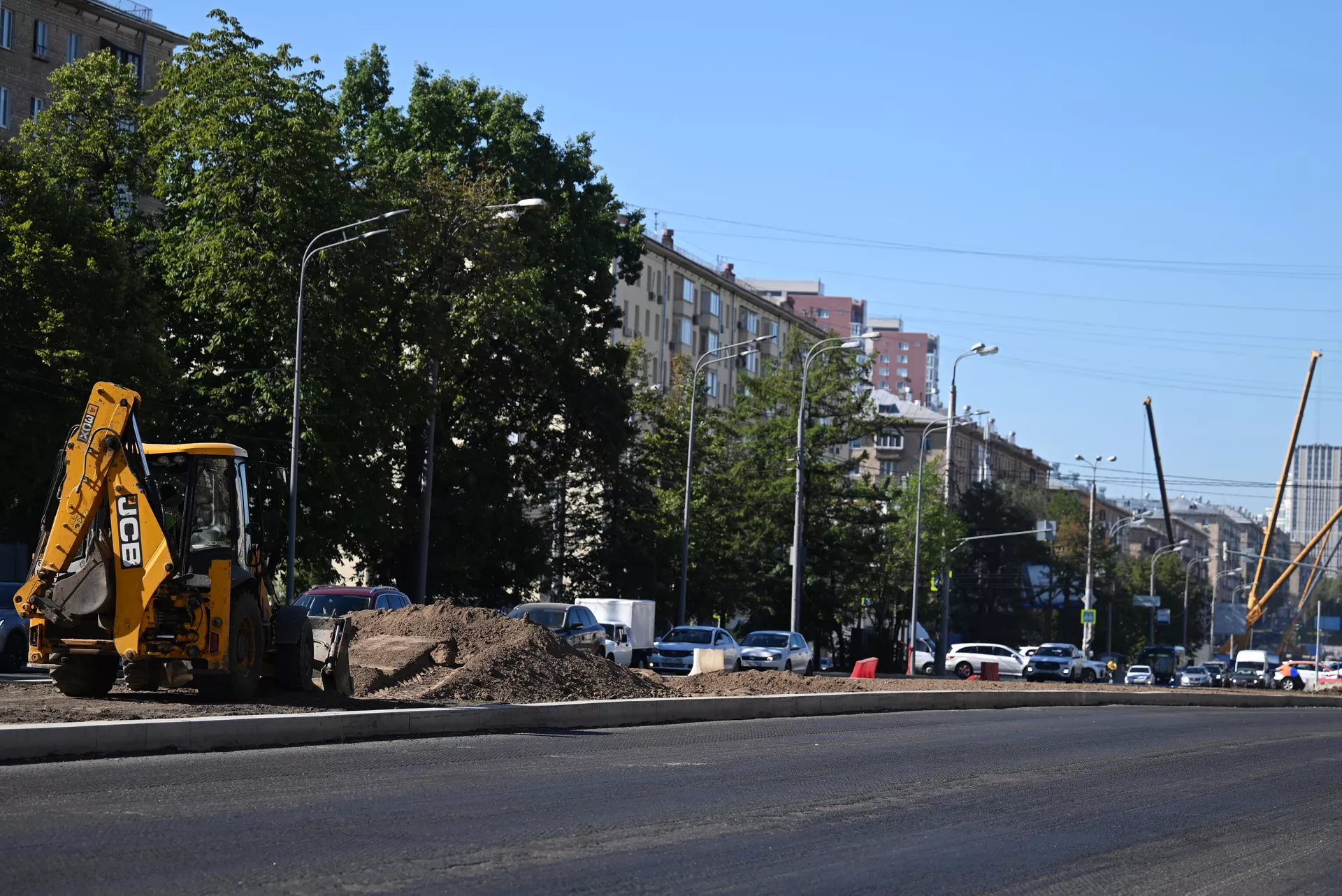 Ремонтные работы на Молодежной улице в Москве Ремонтные работы на Молодежной улице в Москве - РИА Новости, 1920, 02.07.2024