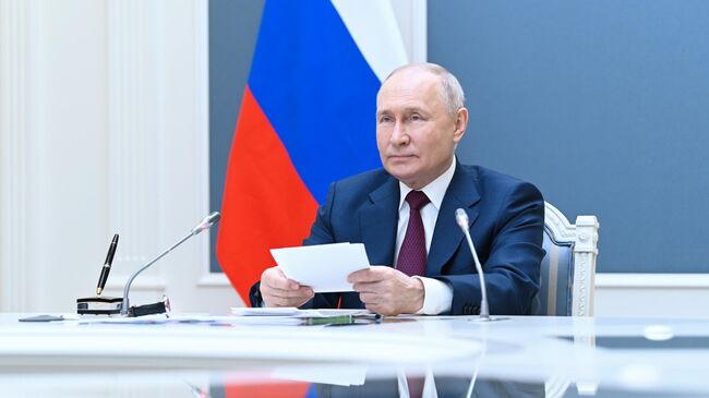 Президент России Владимир Путин принимает в режиме видеоконференции участие в заседании Совета глав государств — членов Шанхайской организации сотрудничества