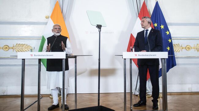 Премьер Индии Нарендра Моди и канцлер Австрии Карл Нехаммер во время совместной пресс-конференции в Вене. 10 июля 2024