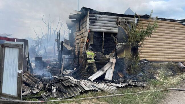 Место пожара в частном секторе в Омске