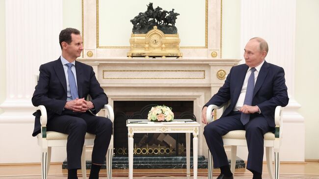 Президент России Владимир Путин и президент Сирии Башар Асад во время встречи