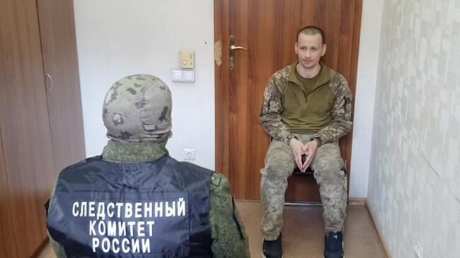 Украинский морпех Леонид Шкильнюк, осужденный на 21 год колонии строгого режима за расстрел машины с мирным жителем в 2022 году в Мариуполе