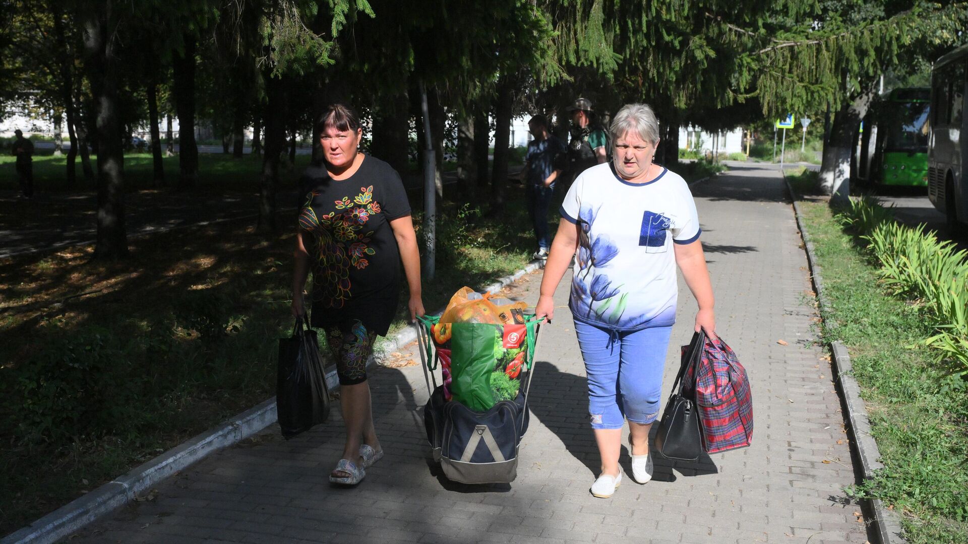 Жительницы приграничных районов Курской области, пострадавших в результате атаки ВСУ, в пункте эвакуации - РИА Новости, 1920, 19.08.2024