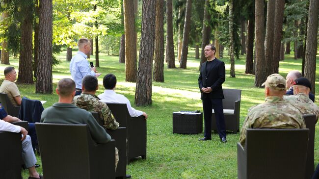 Заместитель председателя Совета безопасности РФ Дмитрий Медведев во время встречи с участниками специальной военной операции – кандидатами в депутаты. 27 августа 2024