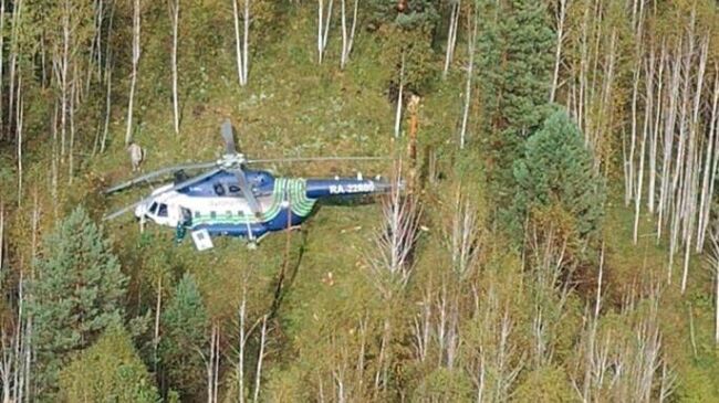 Место происшествия, где вертолет совершил жесткую посадку в 85 километрах от Иркутска