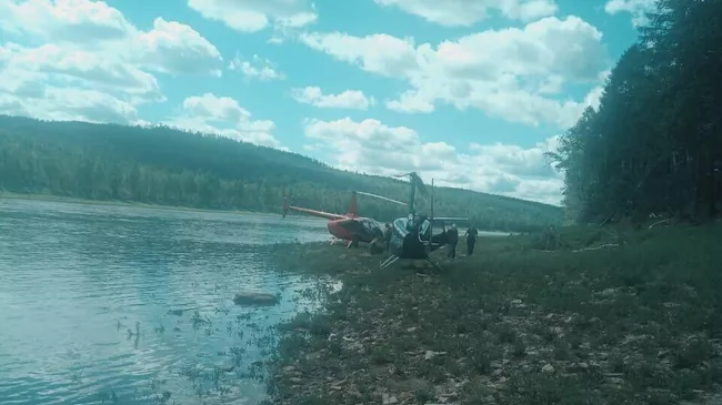Поиск вертолета Robinson R66, на борту которого находились три человека в Зейском районе Приамурья