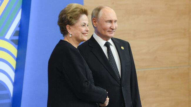 Президент России Владимир Путин и президент Нового банка развития БРИКС Дилма Роуссефф