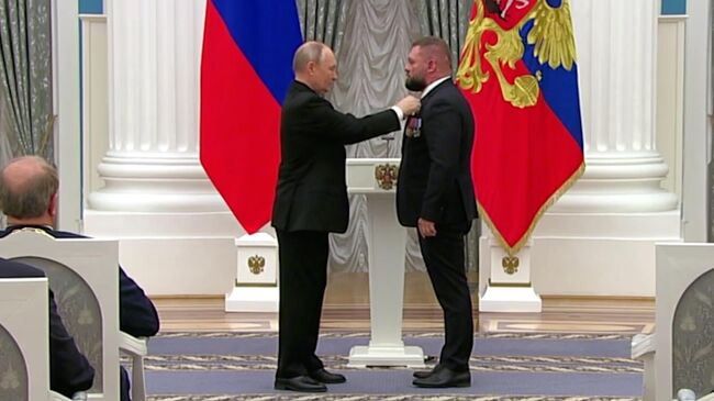 Награждение военкора Евгения Поддубного в Кремле