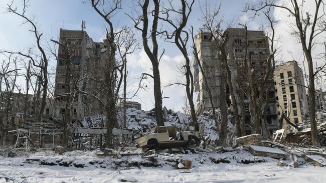 Поврежденные жилые дома в городе Авдеевка