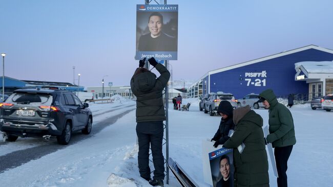 Плакат кандидата от политической партии Демократы в Илулиссате, Гренландия