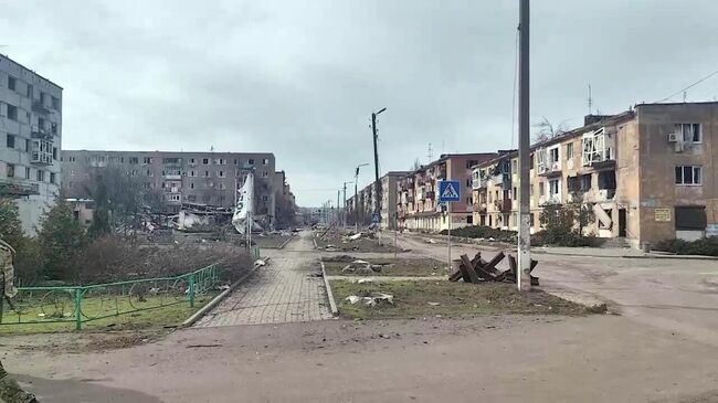 Поврежденные дома в Курахово