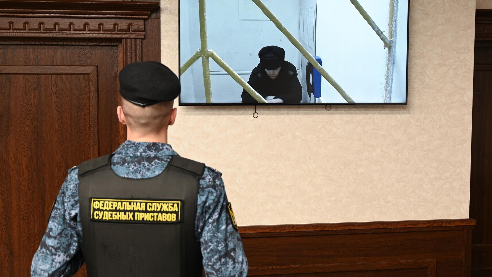 Гражданин Украины Григорий Синченко во время оглашения приговора в режиме видеосвязи на заседании Южного окружного военного суда Ростова-на-Дону Гражданин Украины Григорий Синченко во время оглашения приговора в режиме видеосвязи на заседании Южного окружного военного суда Ростова-на-Дону - РИА Новости, 1920, 19.03.2025
