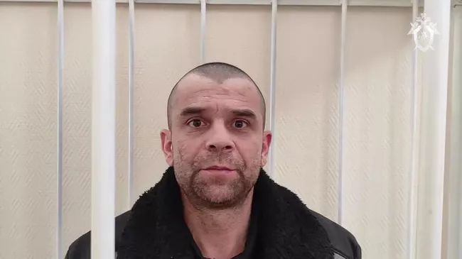Украинский военнослужащий Борис Николенко, запугивавший мирных жителей Курской области, в суде. Кадр видео
