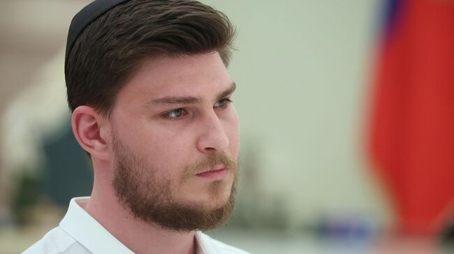 Бывший заложник ХАМАС Александр Труфанов на встрече с президентом РФ Владимиром Путиным. 16 апреля 2025