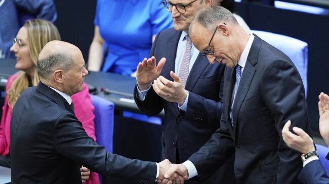 Олаф Шольц и Фридрих Мерц