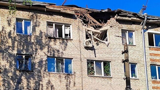 Жилой дом, поврежденный в результате атаки украинского беспилотника, в Туле