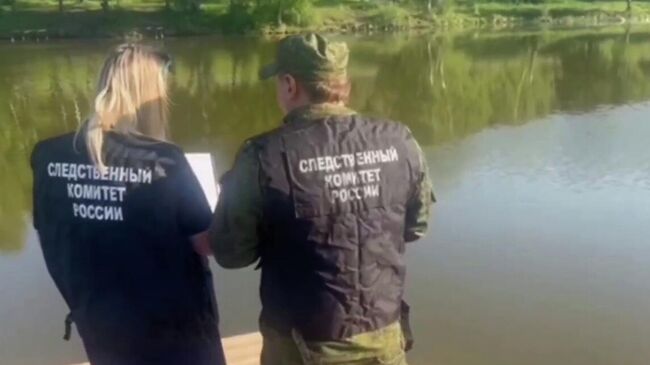 Работа СК РФ на месте обнаружения тела новорожденной девочки в районе села Зыково в Красноярском крае