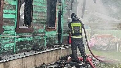 На месте пожара в поселке Куровское Московской области. 12 июня 2025 - РИА Новости, 1920, 13.06.2025