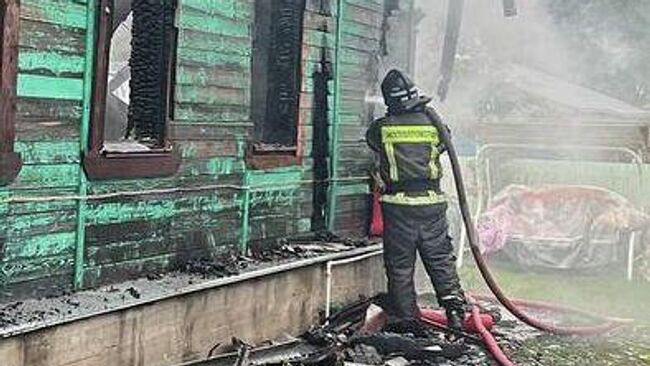 На месте пожара в поселке Куровское Московской области. 12 июня 2025