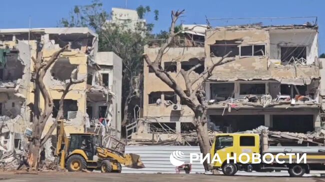 Поврежденные жилые дома в Тель-Авиве