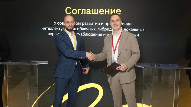 Генеральный директор Билайна Сергей Анохин и генеральный директор Ivideon Заур Абуталимов