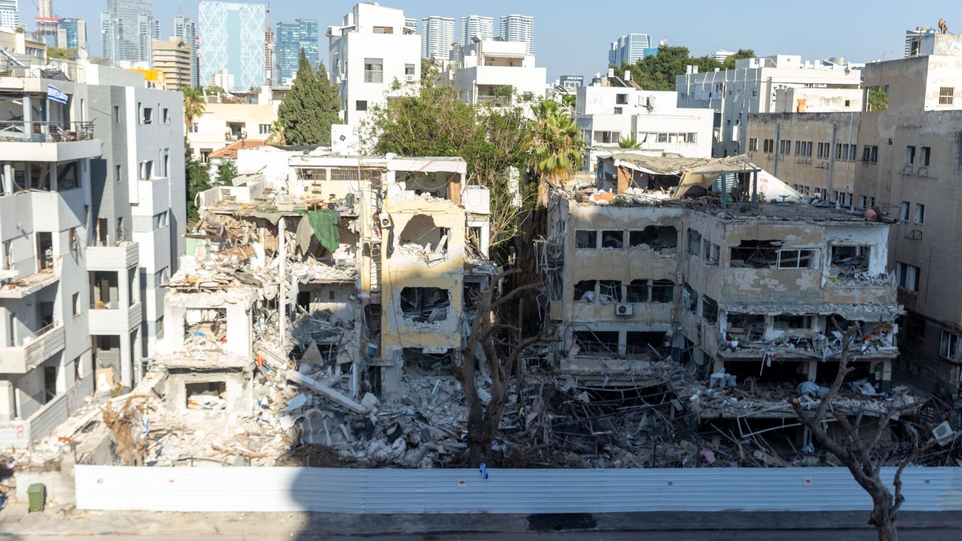 Последствия ракетной атаки Ирана на Тель-Авив - РИА Новости, 1920, 19.06.2025