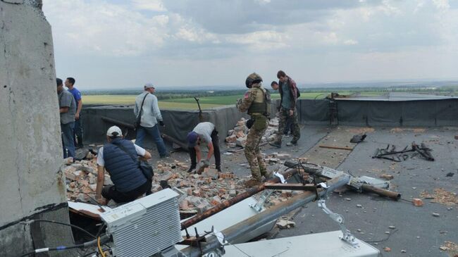 Ликвидация последствий ночной атаки БПЛА в Шахтерске, ДНР