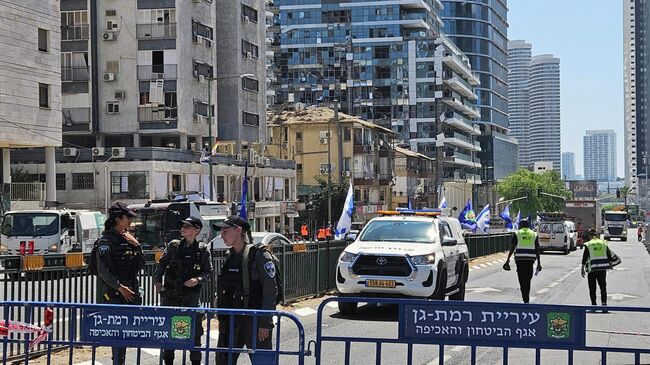 Здание в финансовом квартале Тель-Авива, поврежденное в результате ракетной атаки Ирана