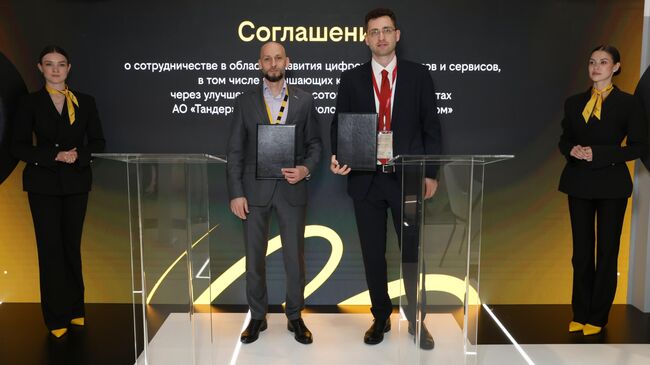 Генеральный директор Билайна Сергей Анохин и генеральный директор группы компаний Магнит Евгений Случевский