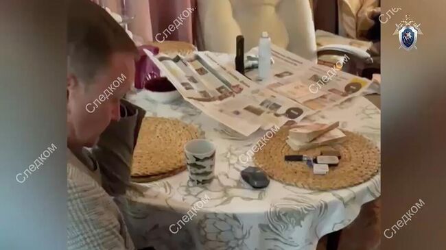 Олег Милюта во время задержания