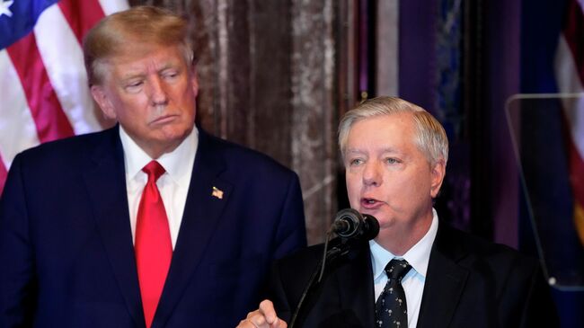 Дональд Трамп и сенатор Линдси Грэм*