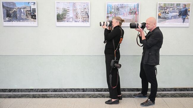 Открытие фотовыставки Хроники террора украинского неонацистского режима в Государственной думе РФ