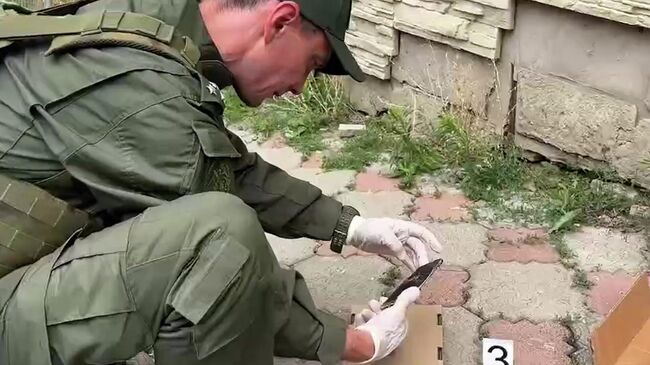 Работа следователей на месте взрыва в Луганске 