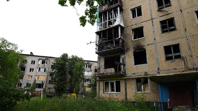 Пострадавшие от обстрелов пятиэтажки в Авдеевке