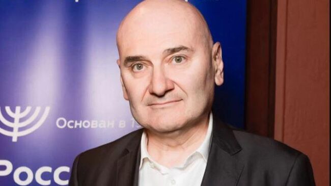 Александр Генцис