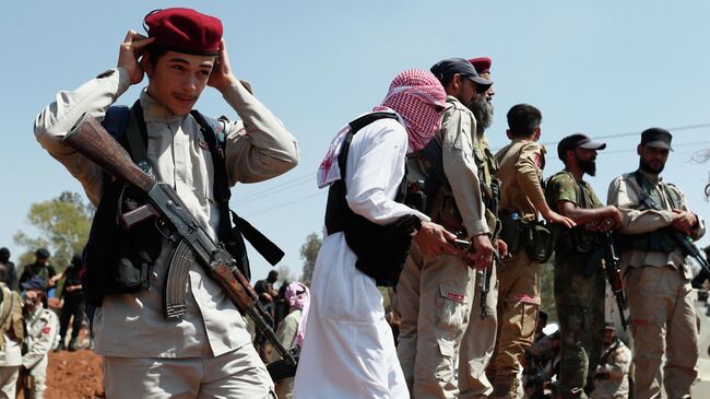 Вооруженные бедуины на окраине Сувейды